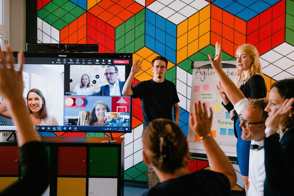 Hybrides Teammeeting bei AXA